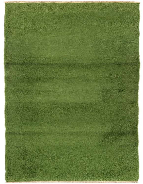 A vibrant green 11 ft runner rug with a plush shag pile, handmade from wool, perfect for a hallway.