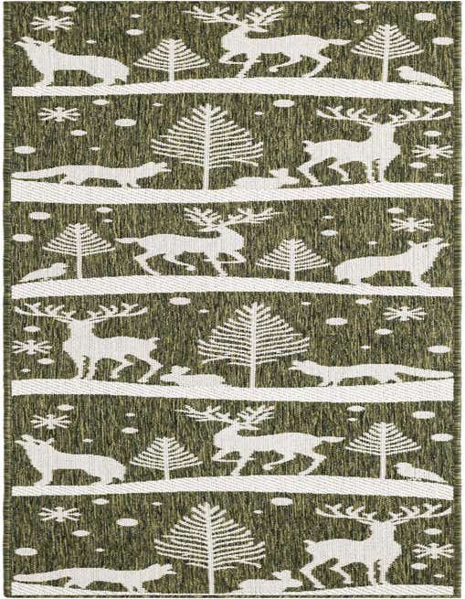 A long green runner rug with a repeating white winter forest scene featuring deer, foxes, rabbits, birds, and pine trees under falling snow and snowflakes.