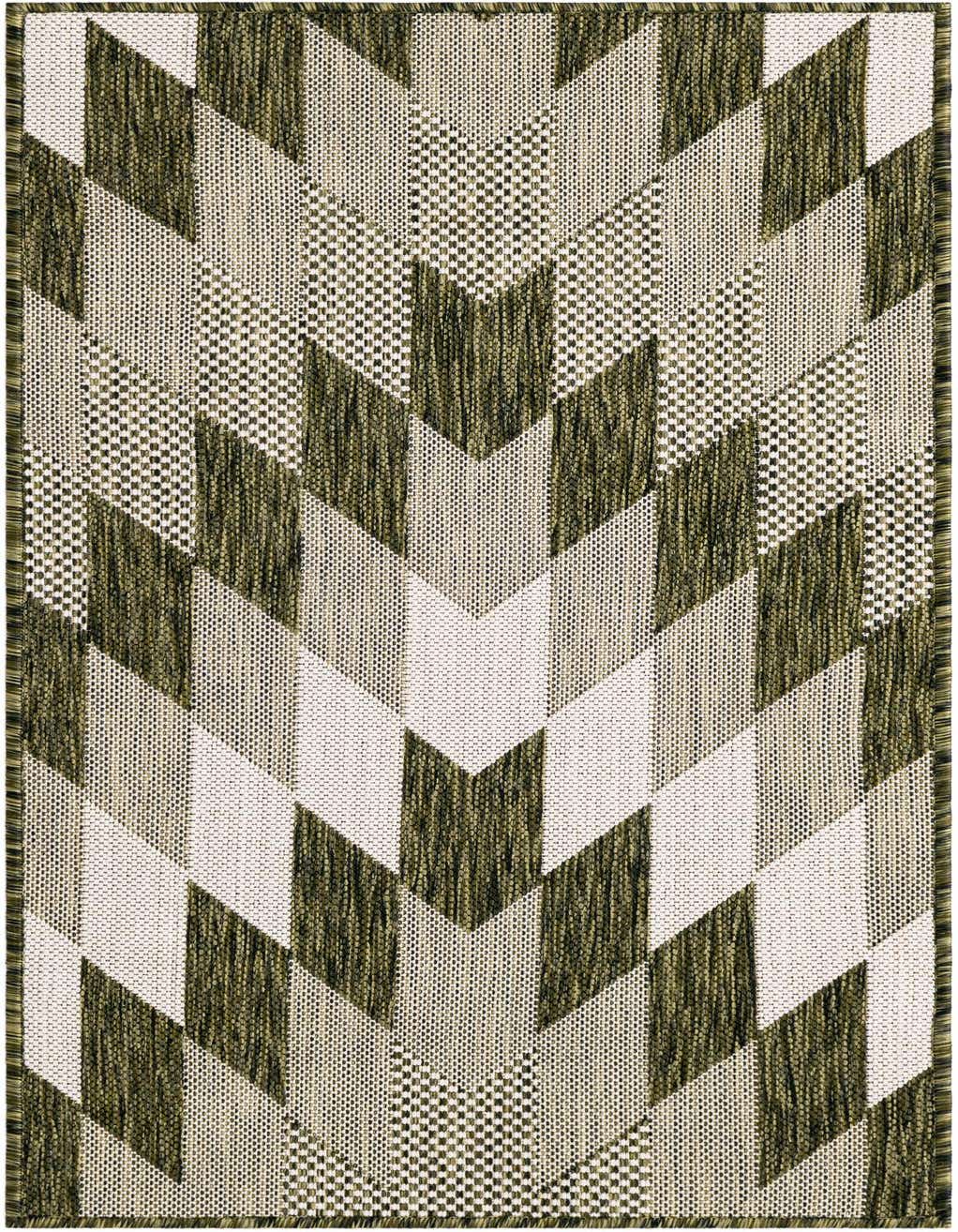 A 4 ft runner rug in green and off-white, featuring a bold geometric tribal pattern, ideal for a hallway or patio.