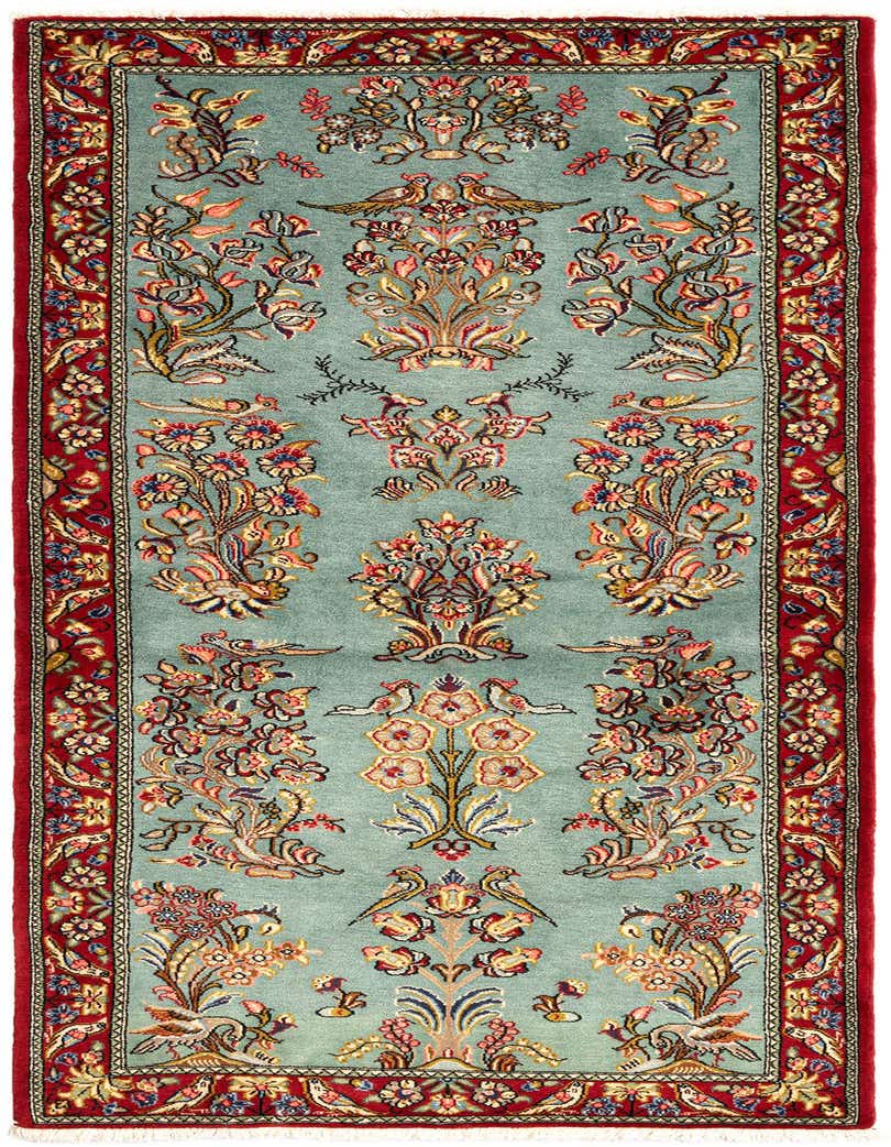 A handmade 7 ft runner rug with a light green field, featuring an intricate Persian floral and bird pattern, framed by a rich red border.