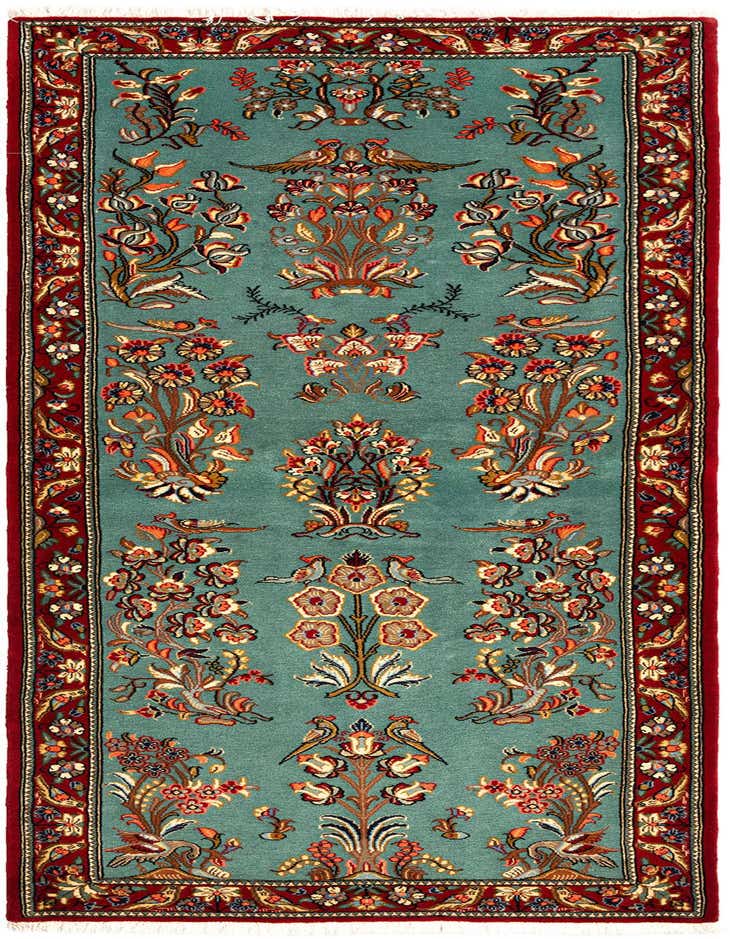 A 7 ft runner rug in green with a detailed Persian floral and bird pattern, framed by a deep red border.