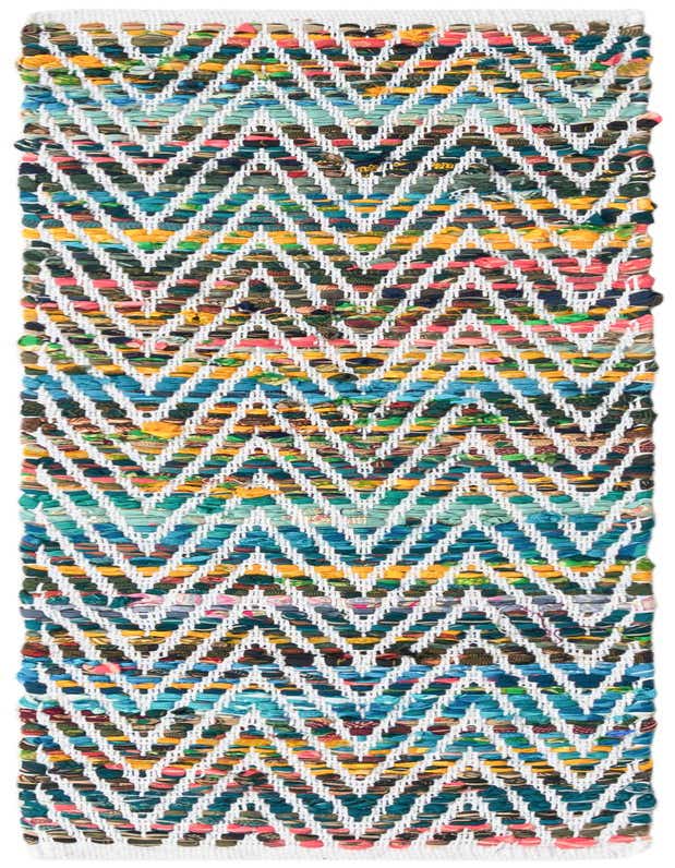 A 1'2" x 4'1" Chindi Chevron table runner rug featuring a vibrant, multicolored chevron pattern on a white background, made from recycled cotton.