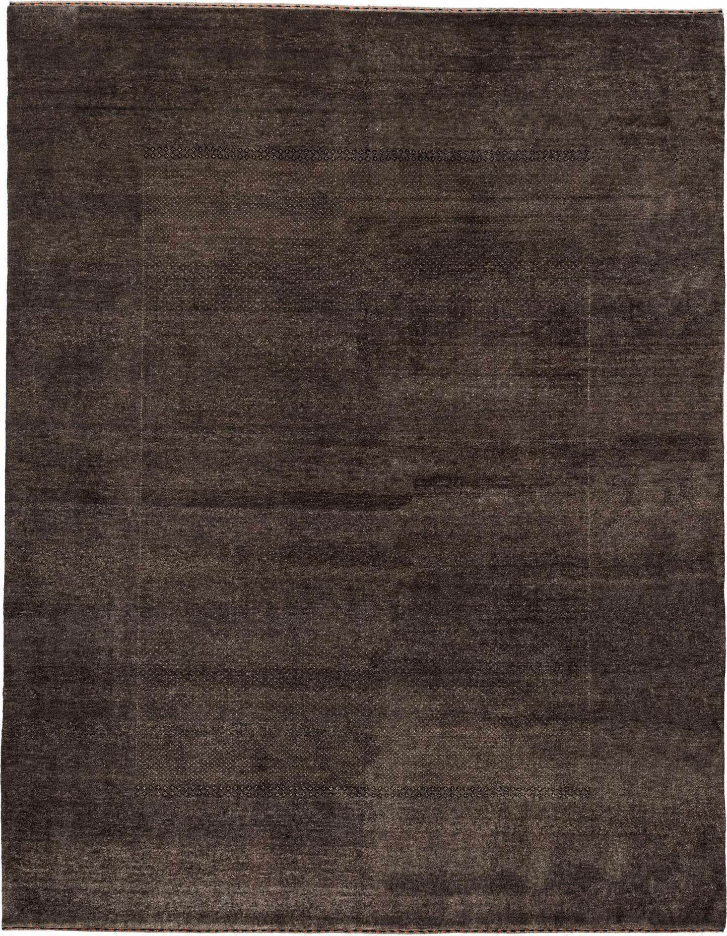 A 4x6 rectangular Gabbeh rug in a solid dark grey color with a subtle textured pattern, suitable for various indoor rooms.