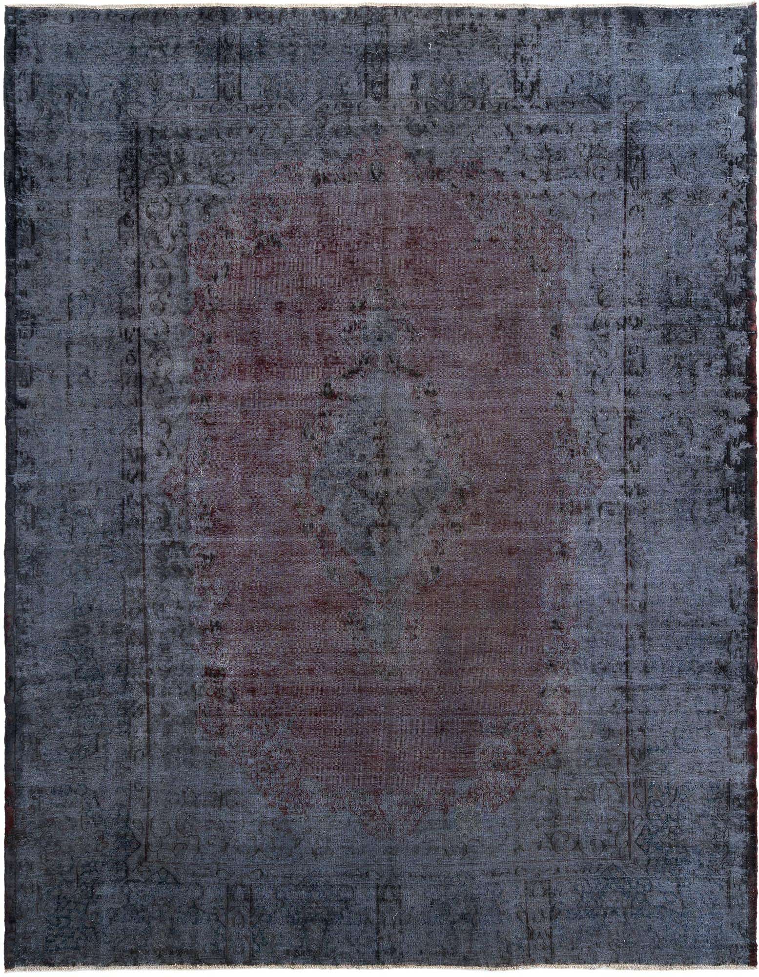 A 10x13 rectangular grey Persian wool rug with a faded, distressed traditional pattern and a central reddish medallion.