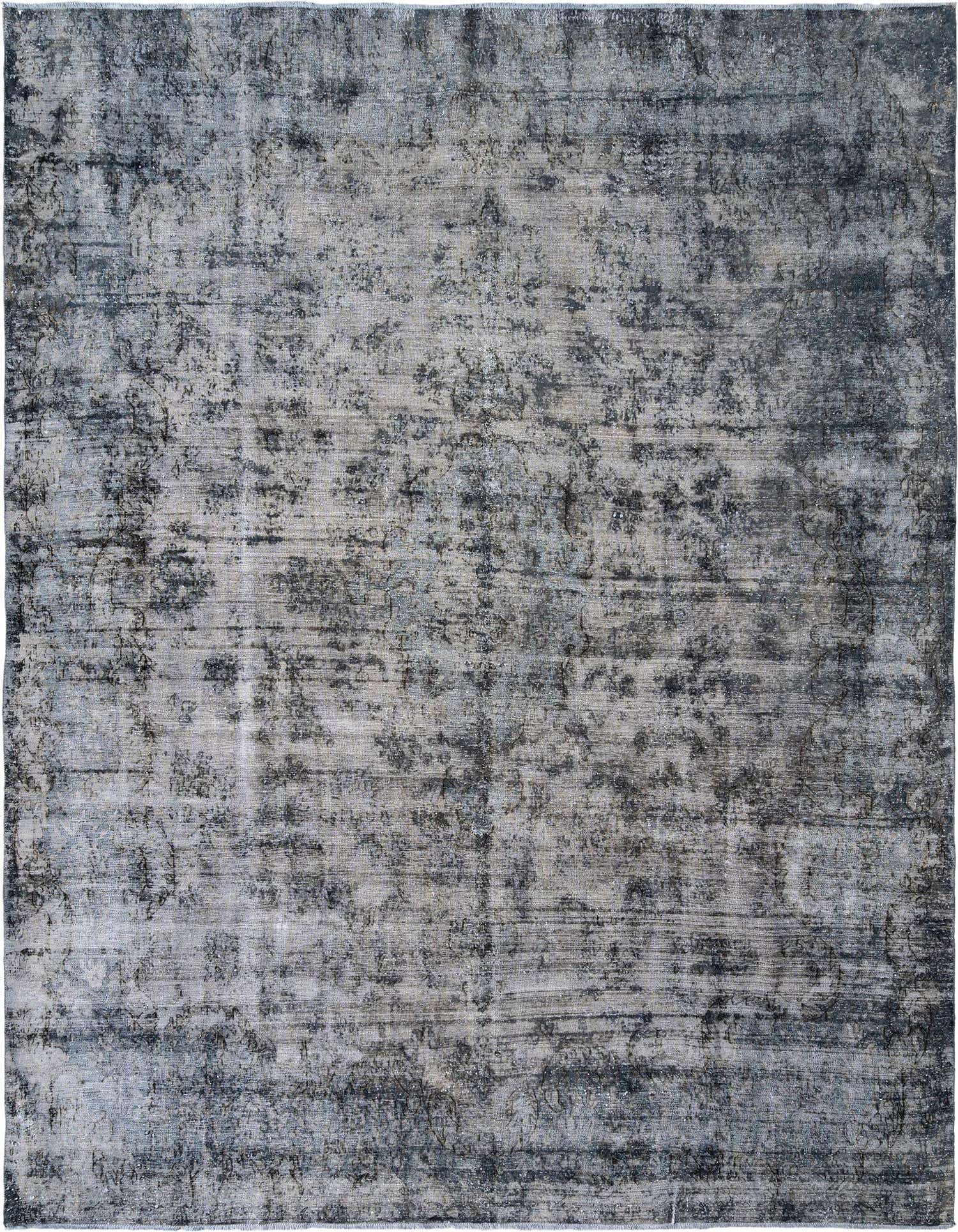 A 10x13 rectangular grey Persian rug with a distressed, vintage pattern, suitable for a living room.