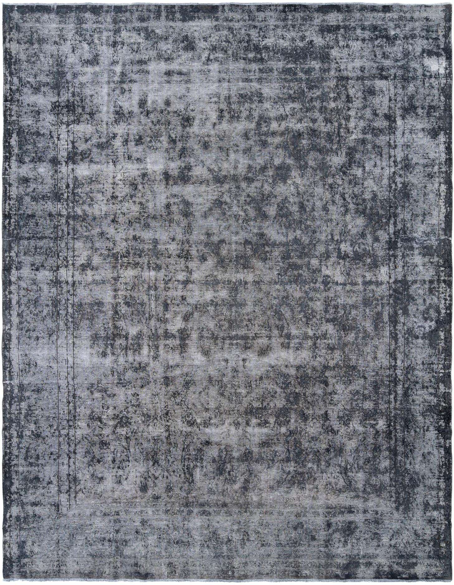 A 10x13 rectangular grey Persian rug with a distressed, vintage-inspired pattern, suitable for a living room.