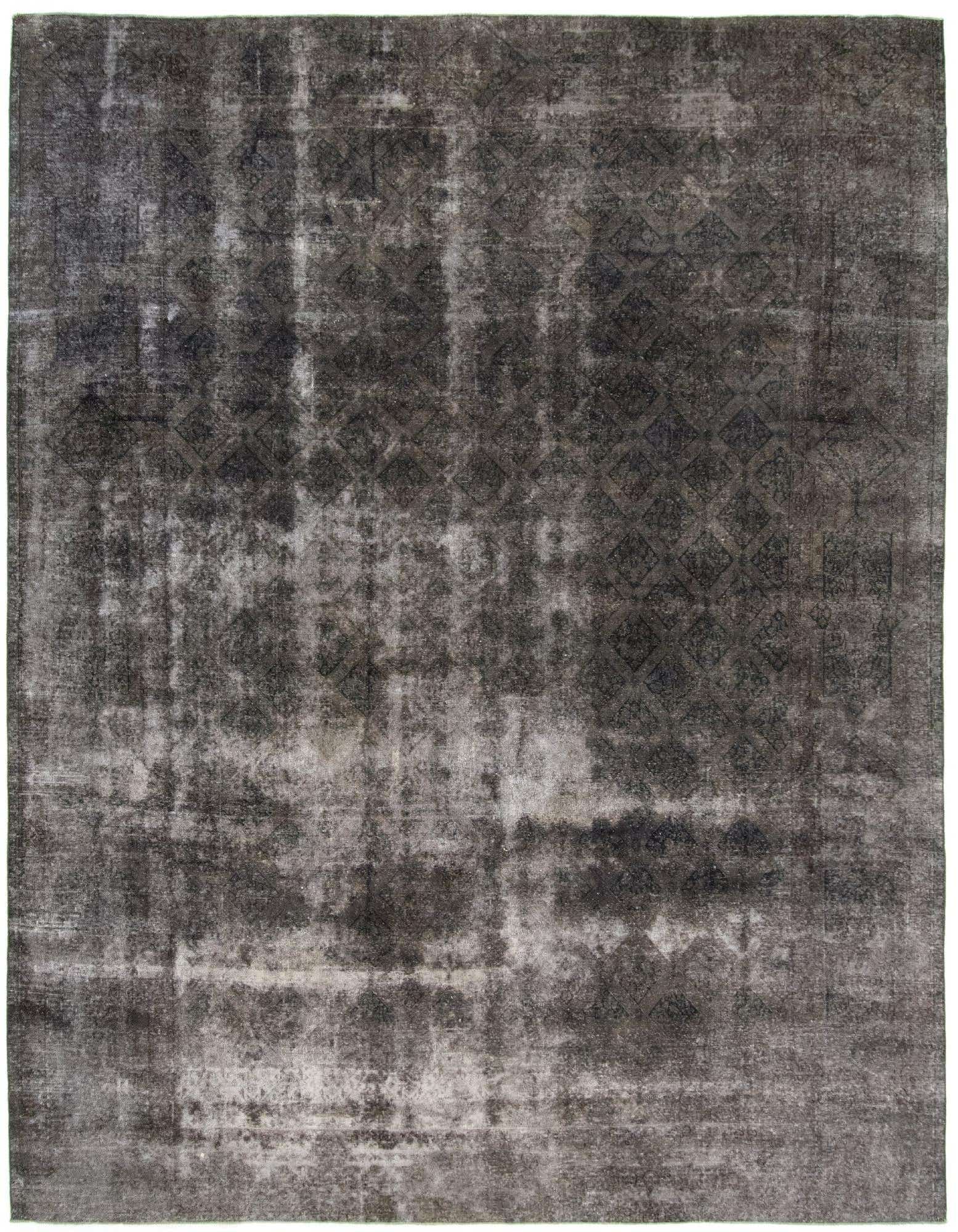 A 10x13 rectangular grey Persian wool rug with a distressed, vintage-inspired pattern, ideal for a living room.