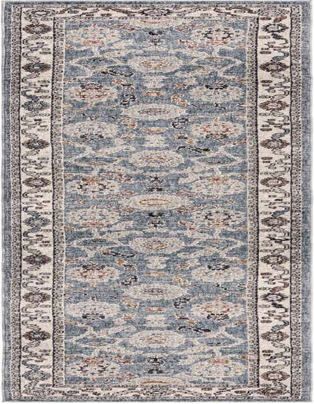 A 12 ft runner rug in shades of blue with a distressed traditional floral pattern and a cream border, ideal for a hallway.