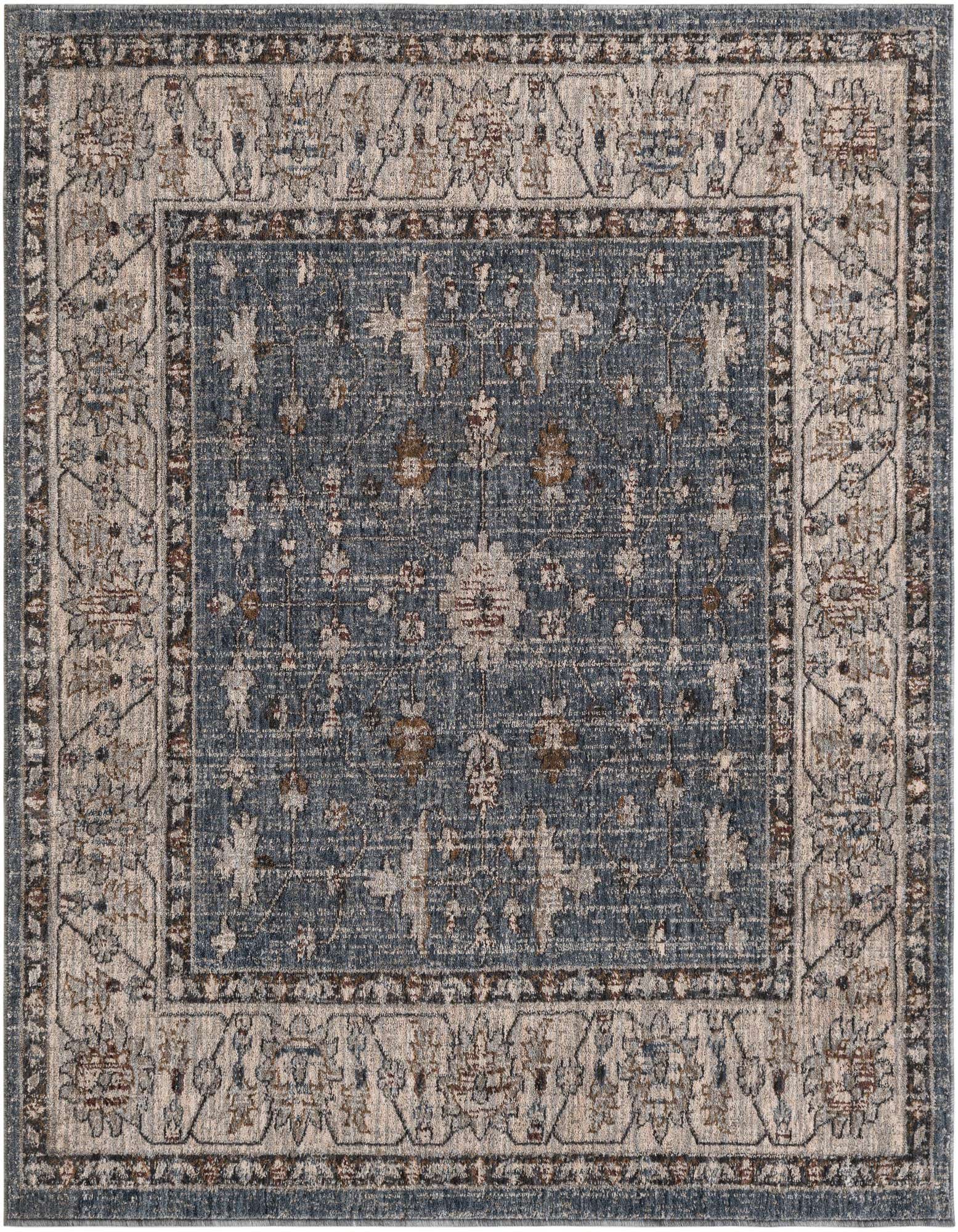A 5' 3 x 5' 3 square blue area rug featuring an intricate traditional pattern with a light border, suitable for indoor use.