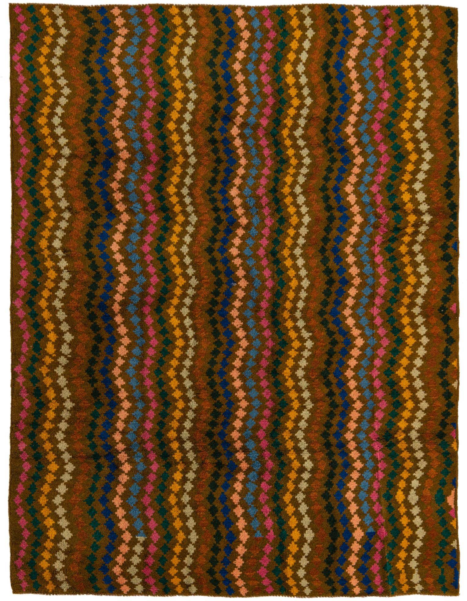 A 7x10 rectangular Balouch rug with a tribal abstract pattern in shades of green, brown, blue, pink, and orange.