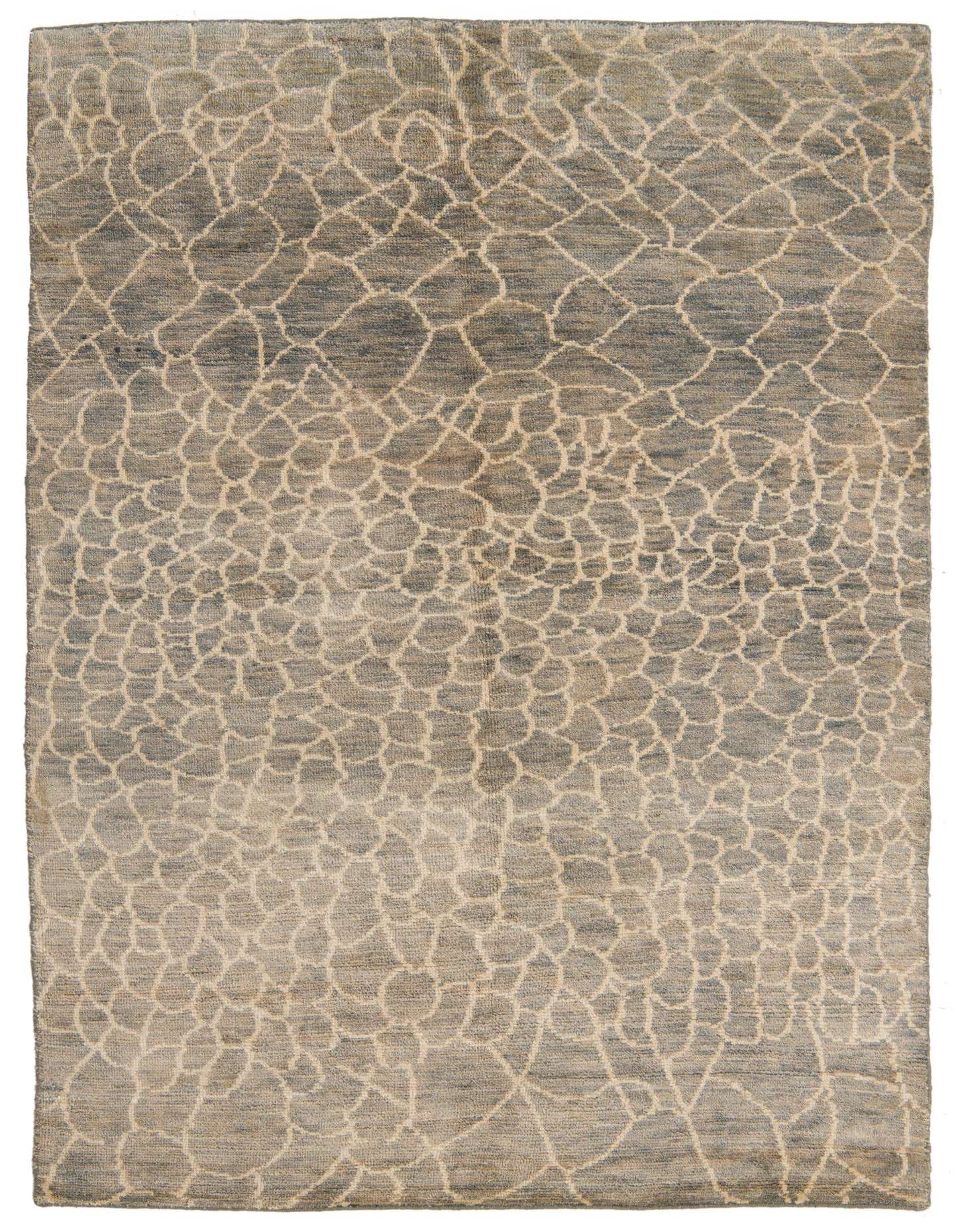 A 5x8 rectangular green wool shag rug with an abstract tribal pattern, ideal for a living room.