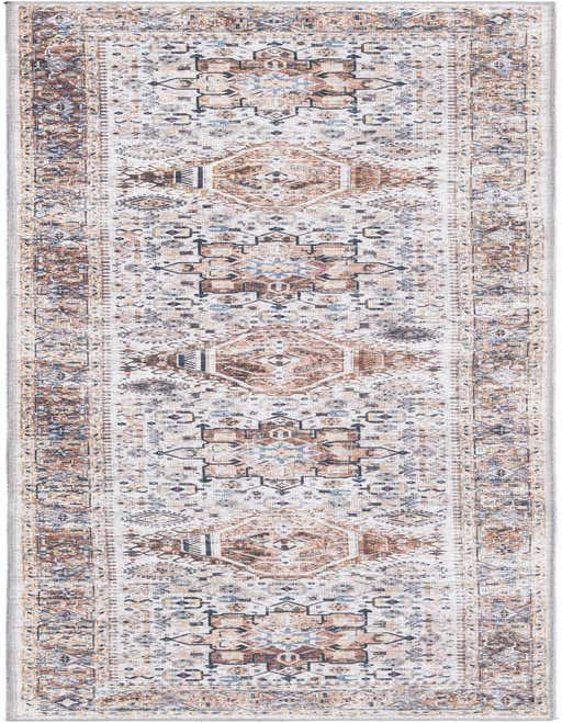 An 8 ft runner rug from the Yara collection, featuring a vintage tribal medallion pattern in browns, tans, ivories, and whites, ideal for a hallway or kitchen.