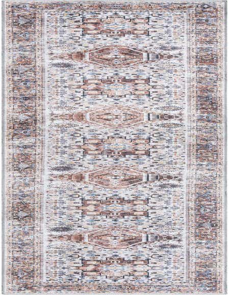 A 12 ft Yara runner rug featuring a distressed traditional medallion pattern in browns, tans, ivories, and blues, ideal for a hallway.