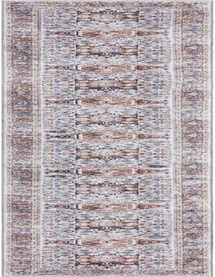 A 20 ft runner rug with a traditional medallion pattern in browns, tans, ivories, and blues, ideal for a long hallway.