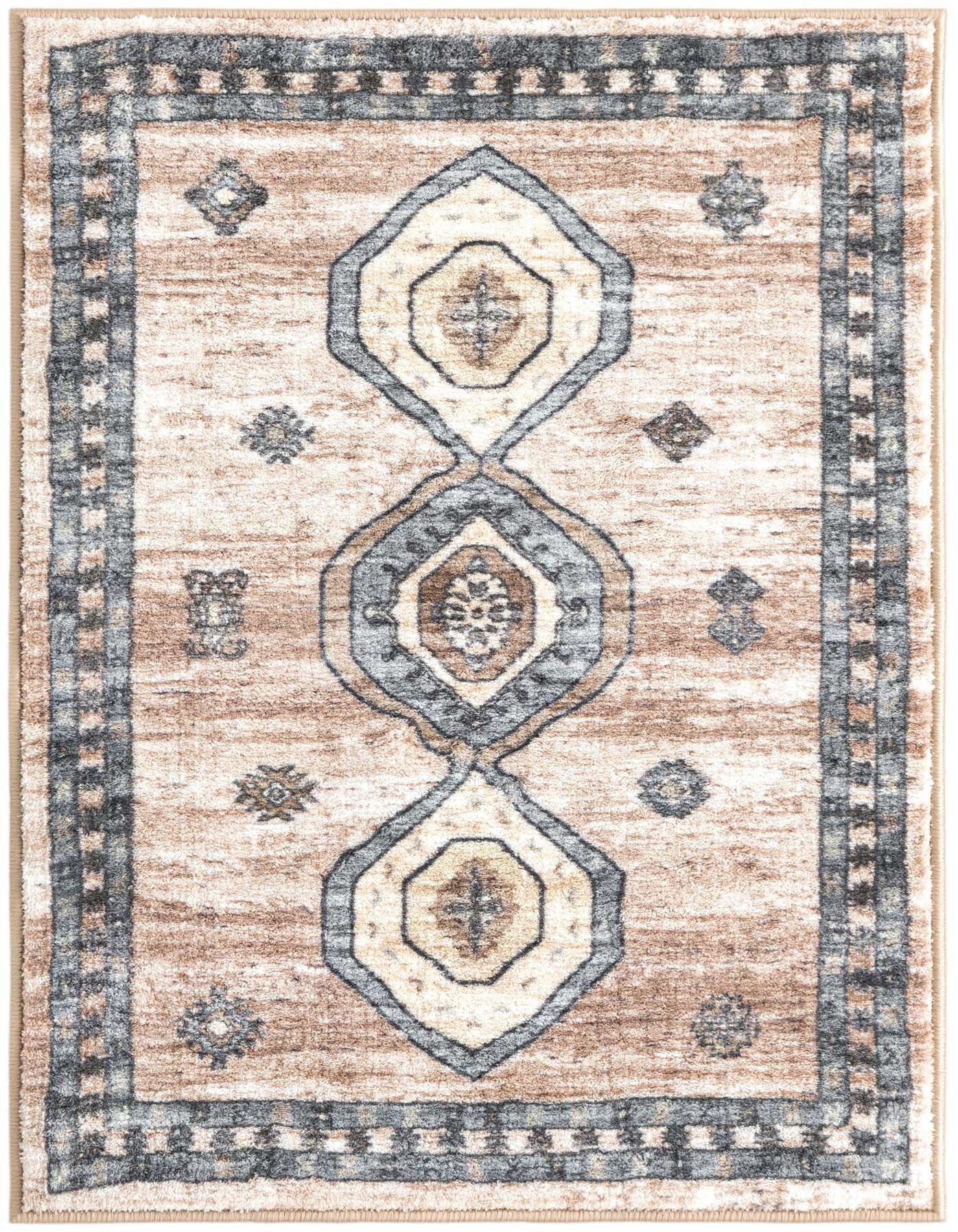 A 2x3 rectangular Medina rug in shades of brown, tan, and cream, featuring a central medallion design and a bordered edge.