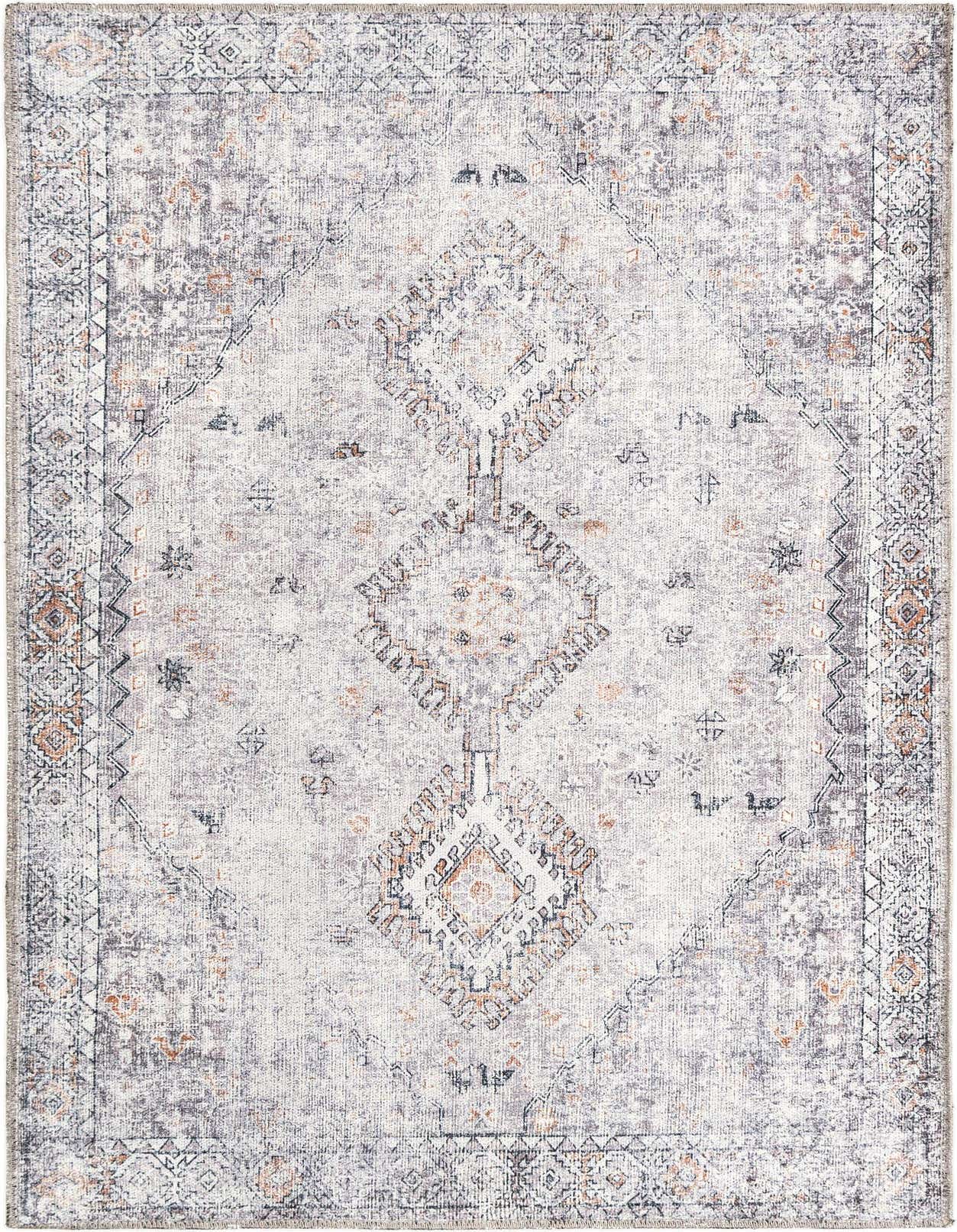 A 3x5 rectangular Yara rug featuring a distressed ivory and brown geometric pattern with a central medallion design.