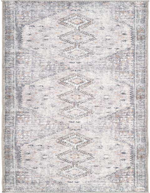 An 8 ft runner rug with a vintage Oriental pattern in browns, tans, ivories, and creams, ideal for a hallway.