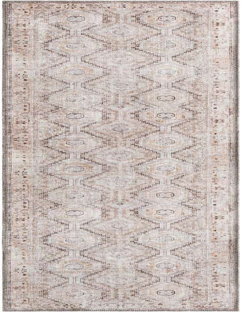 A long 8 ft runner rug featuring a distressed geometric pattern in shades of brown, tan, and cream, ideal for a hallway or kitchen.