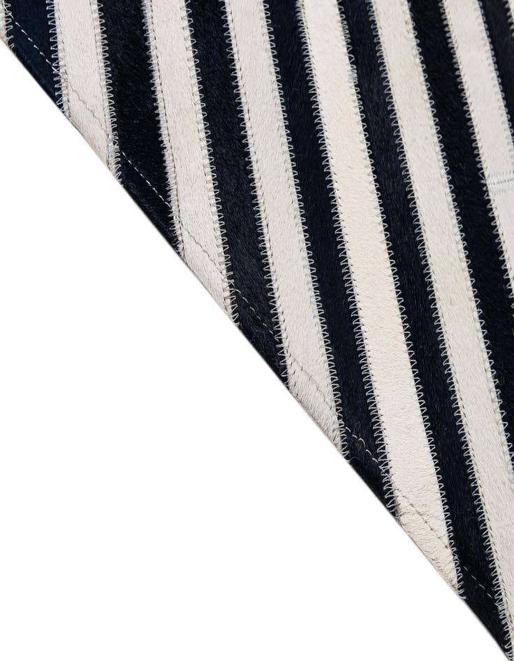 Detail image of  7' 11 x 10' 11 Cowhide - Patchwork Rug