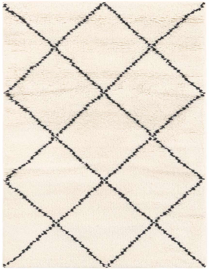 A 5 ft runner rug, Safiya Moroccan Wool collection, featuring a tribal black diamond pattern on a textured off-white background.