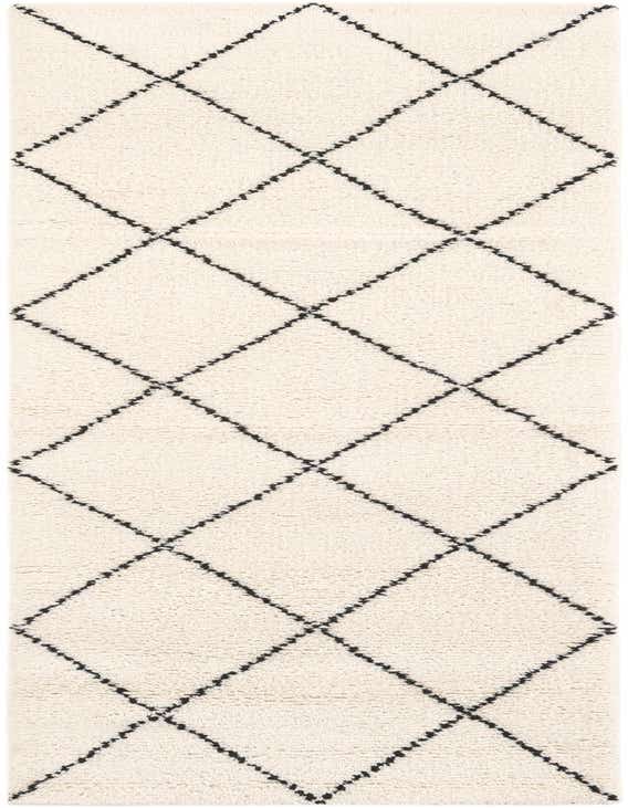 A cream-colored 8 ft runner rug with a black tribal diamond pattern, featuring a textured pile.