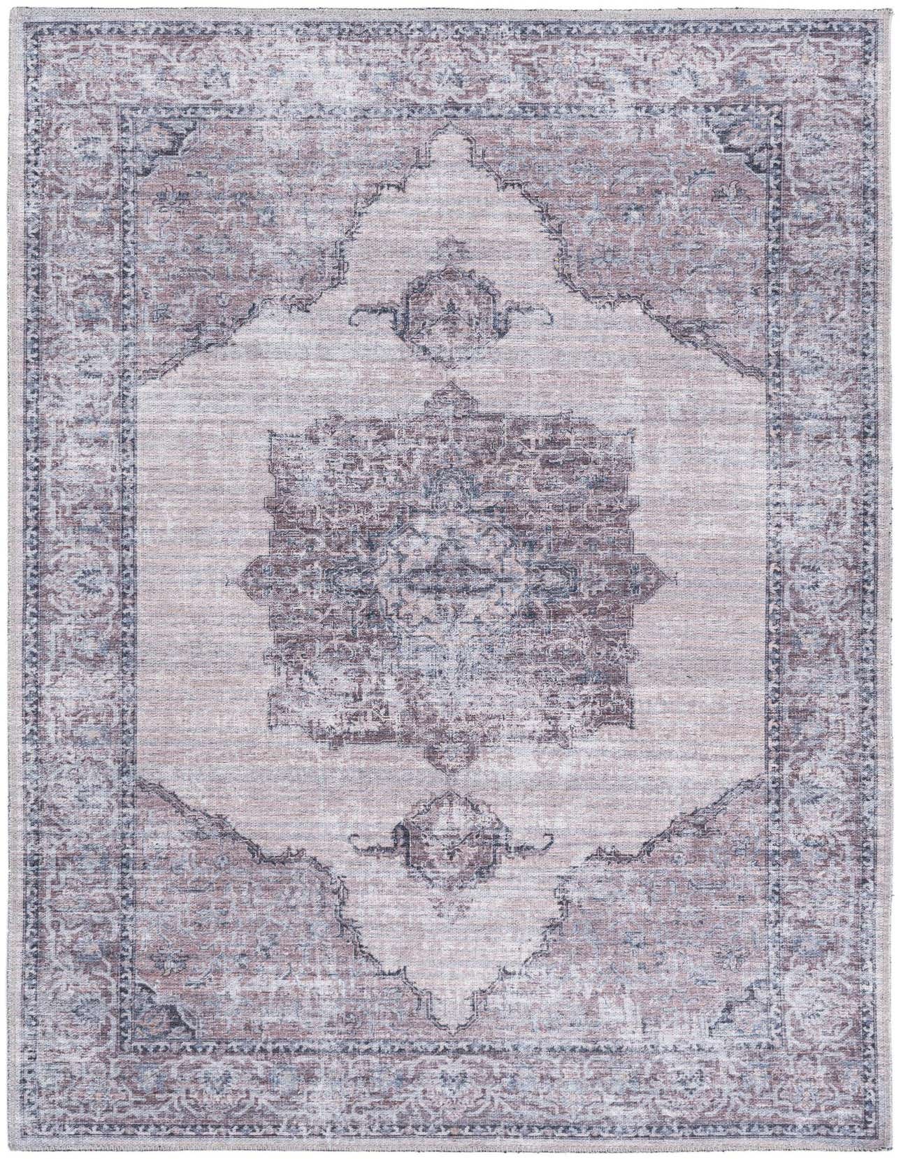A 4x6 rectangular Mangata rug with a faded traditional medallion pattern in ivories, creams, and grays.