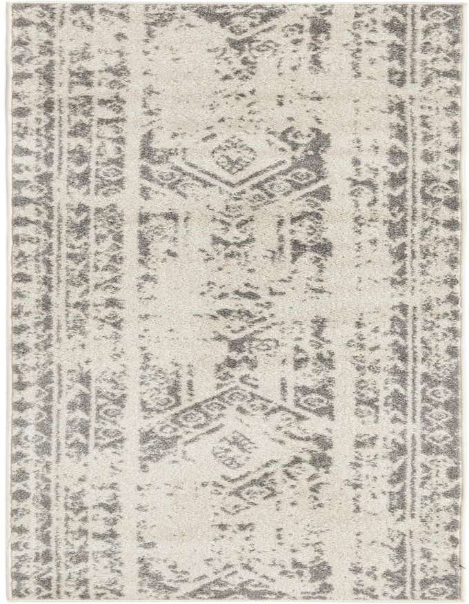 An 8 ft runner rug from the Rugs.com Lennon collection, featuring a distressed Southwestern tribal pattern in ivory and gray.