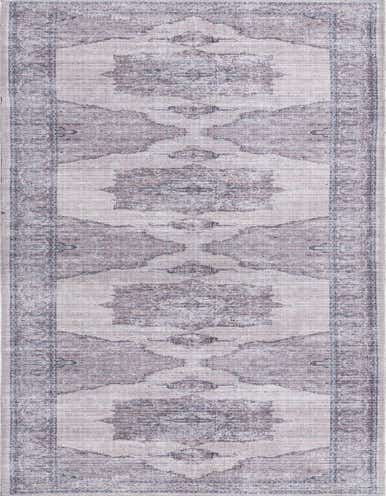 A 13 ft runner rug with a faded traditional medallion pattern in ivories, creams, and grays, ideal for a hallway.