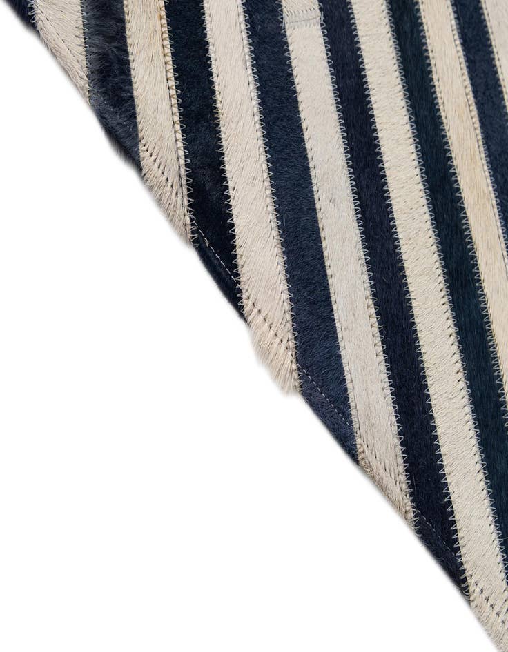 Detail image of  7' 11 x 10' 10 Cowhide - Patchwork Rug