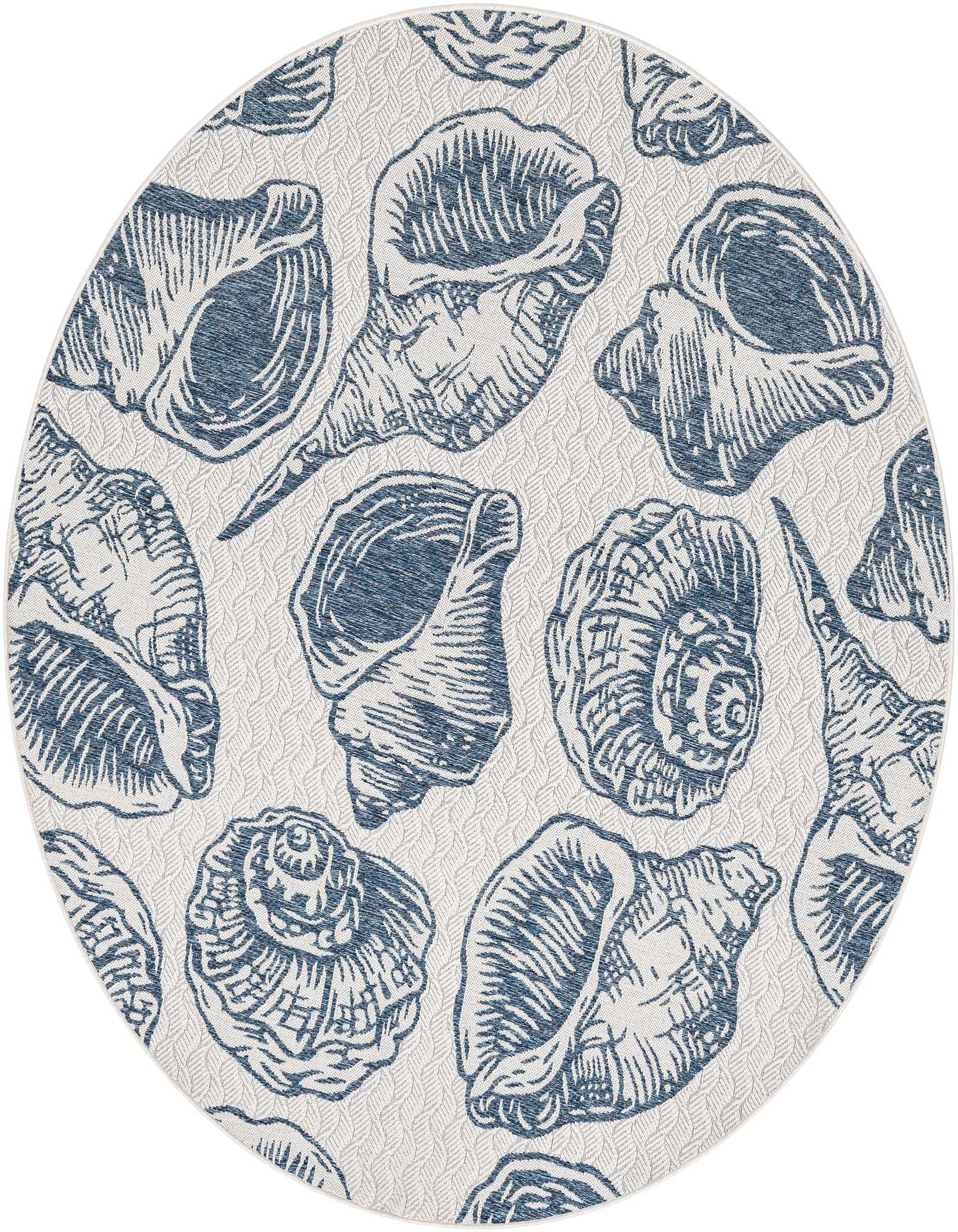 Round indoor/outdoor rug with a white background and various blue seashell illustrations, perfect for a coastal patio.