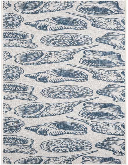 A 12 ft runner rug featuring a repeating pattern of large blue seashells and conches on an ivory and cream background with a subtle chevron texture.