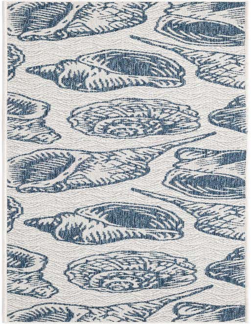 An 8 ft runner rug featuring a repeating pattern of blue and ivory seashells and conchs on a textured flatweave.
