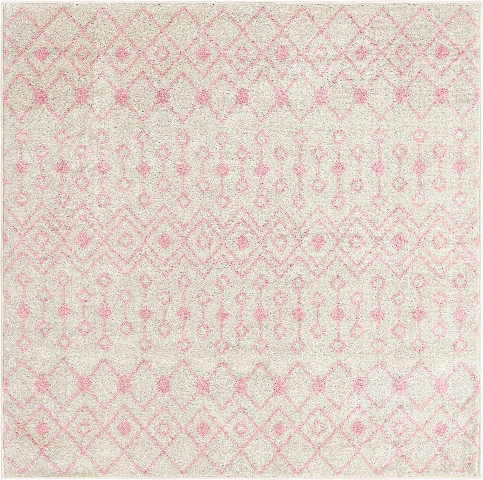 A 5' 3 x 5' 3 square ivory polypropylene rug with a pink bohemian trellis pattern, suitable for indoor spaces.