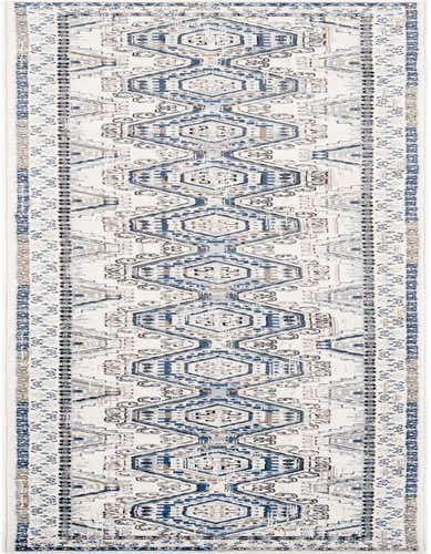 A 16 ft runner rug with a traditional Southwestern tribal pattern in shades of blue, ivory, and cream, ideal for a hallway.