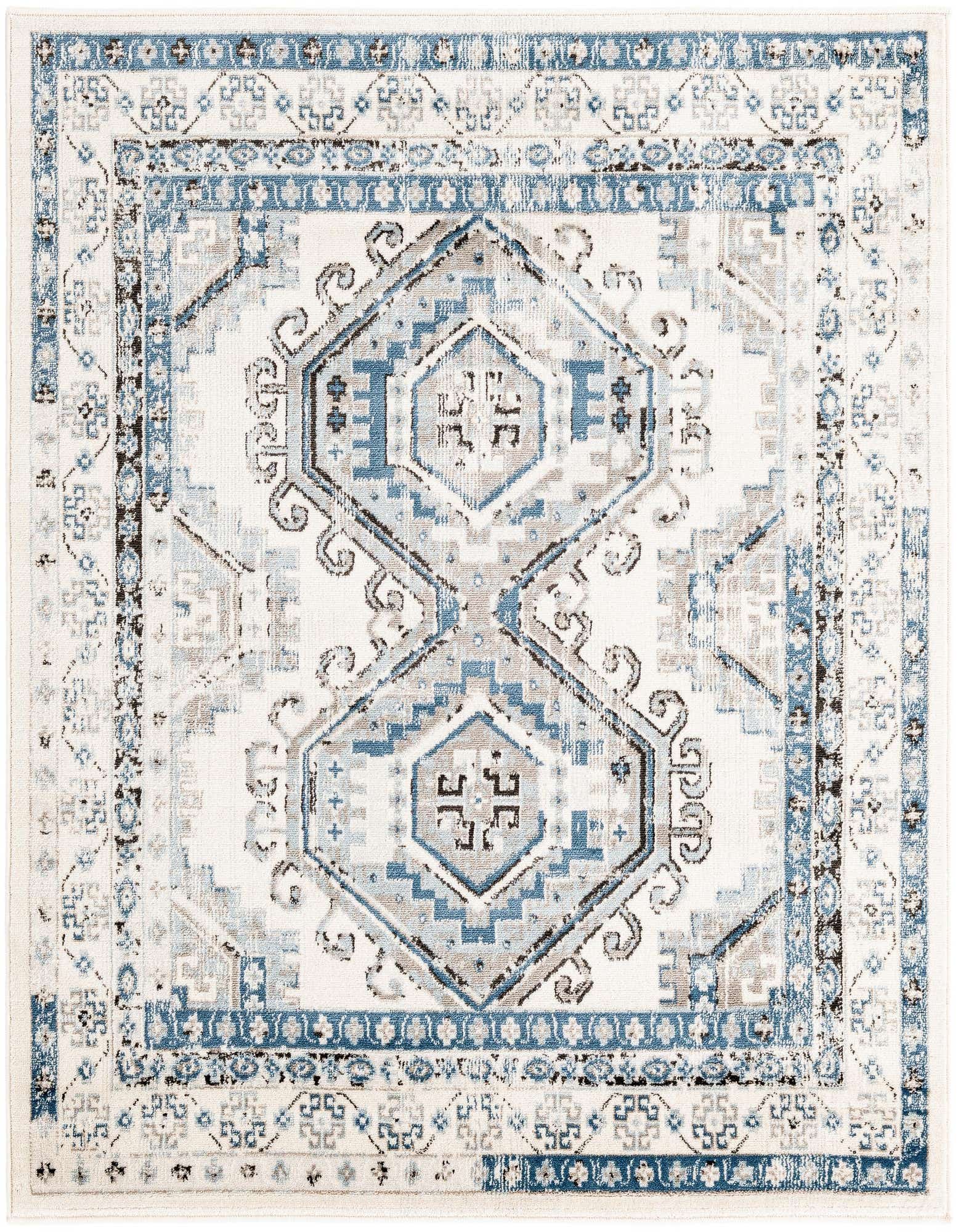 A 5' 3 x 5' 3 square Charlotte rug featuring a faded traditional tribal pattern in blues, ivories, and creams.