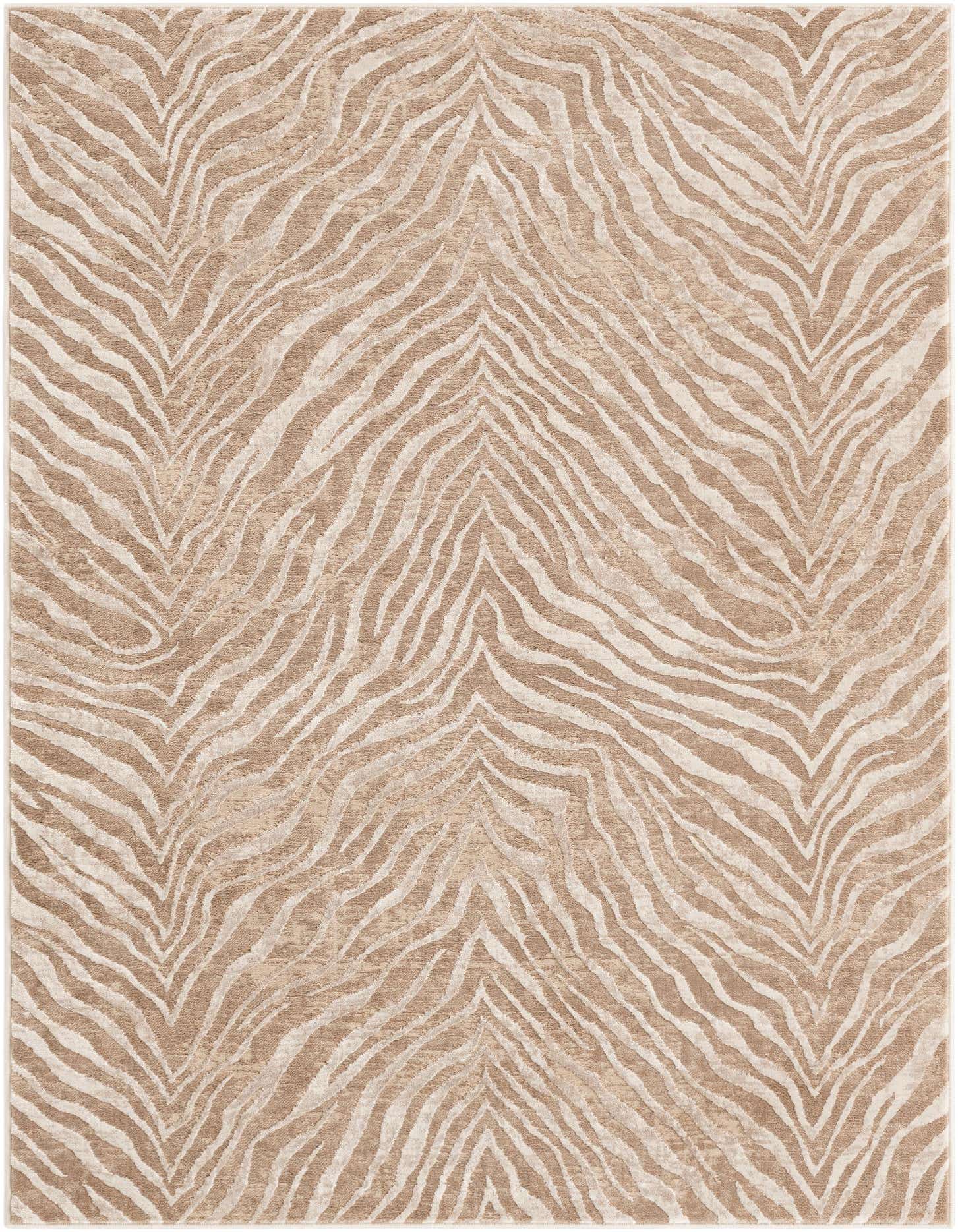 A 5x7 rectangular rug featuring a dynamic zebra stripe pattern in varying shades of brown, tan, and cream.