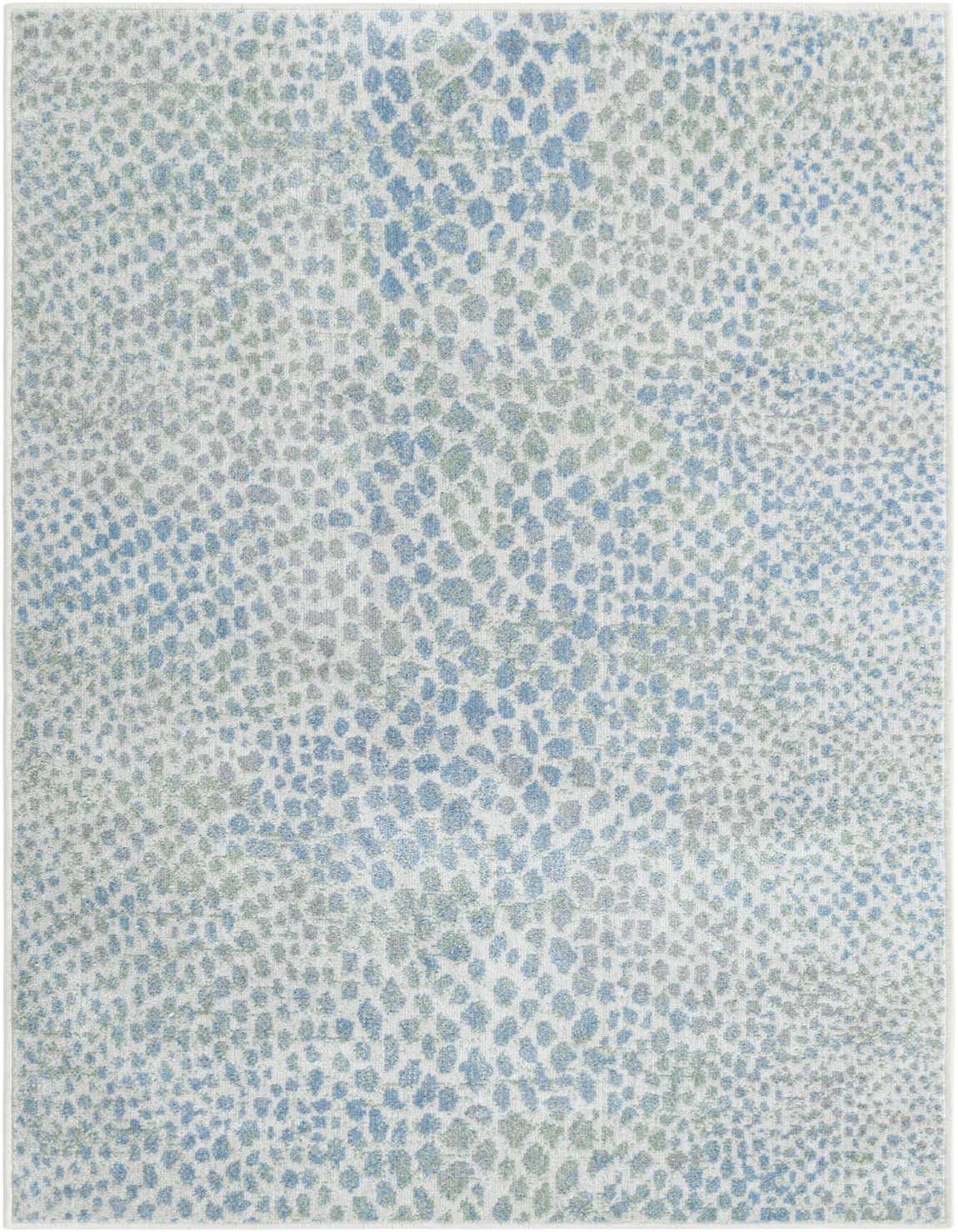 A 3x5 rectangular Kamala Washable rug featuring an abstract pattern of blue, ivory, and cream speckles.