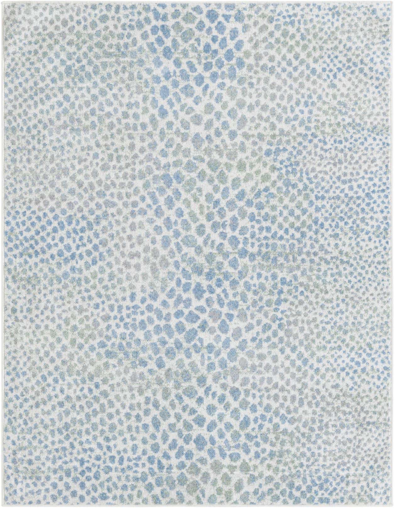 A 4x6 rectangular Kamala Washable rug featuring a modern abstract pattern in varying shades of blue, ivory, and cream.