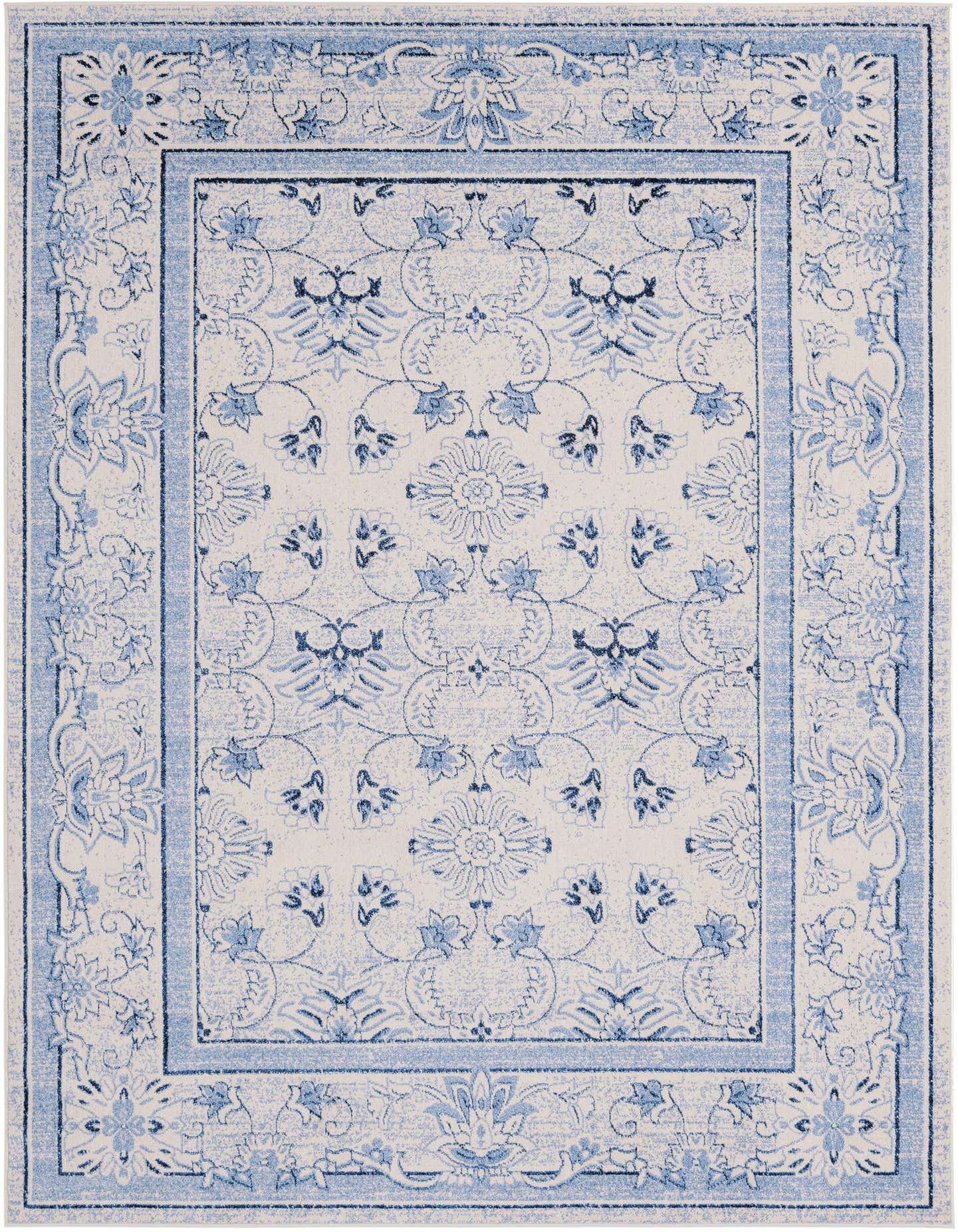 An 8x11 rectangular Miranda rug featuring a traditional botanical pattern in shades of blue and ivory.