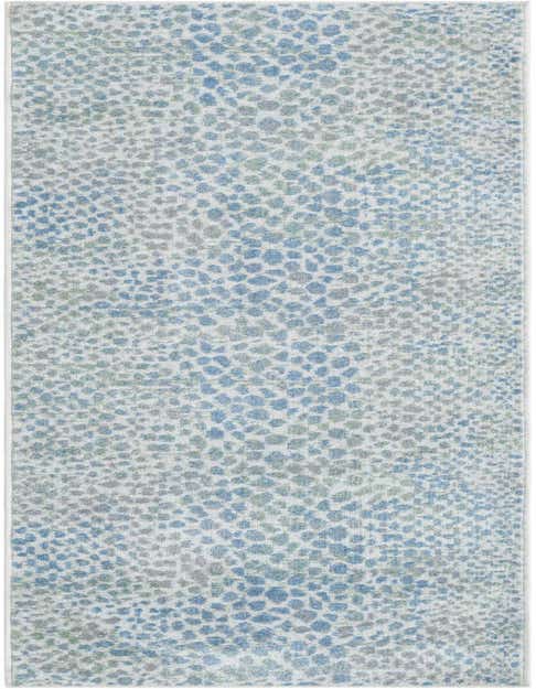 A blue and ivory modern abstract runner rug with a mottled pattern, ideal for a hallway.