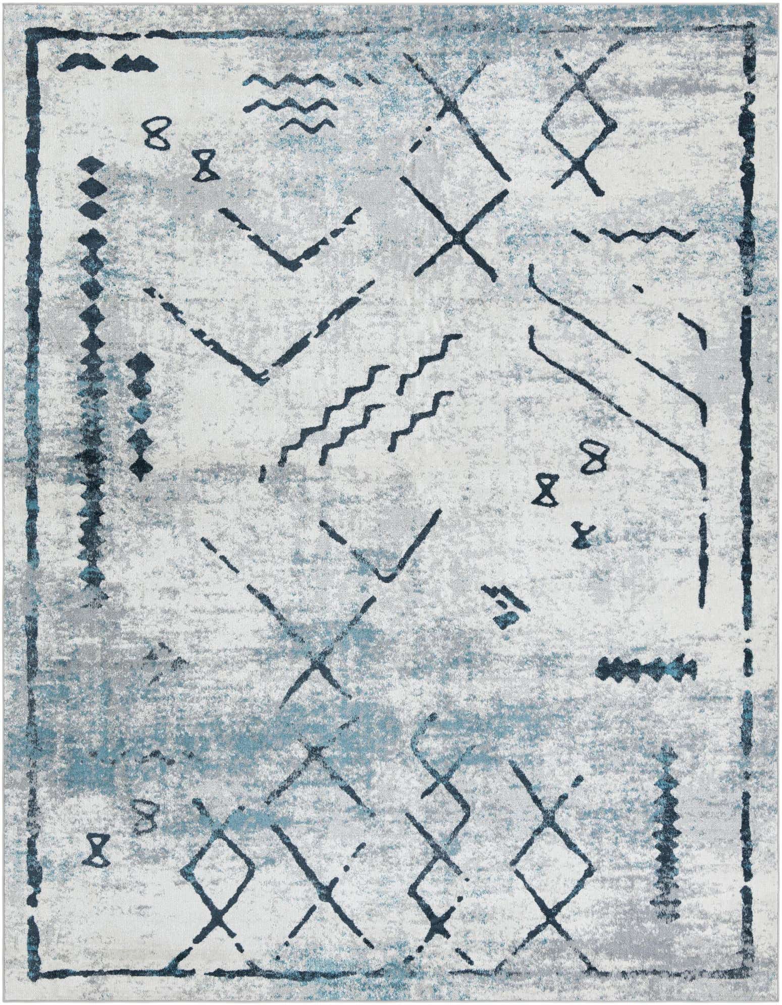 A 9x12 rectangular Kamala Washable rug featuring a distressed ivory, gray, and blue tribal pattern with geometric shapes and lines.