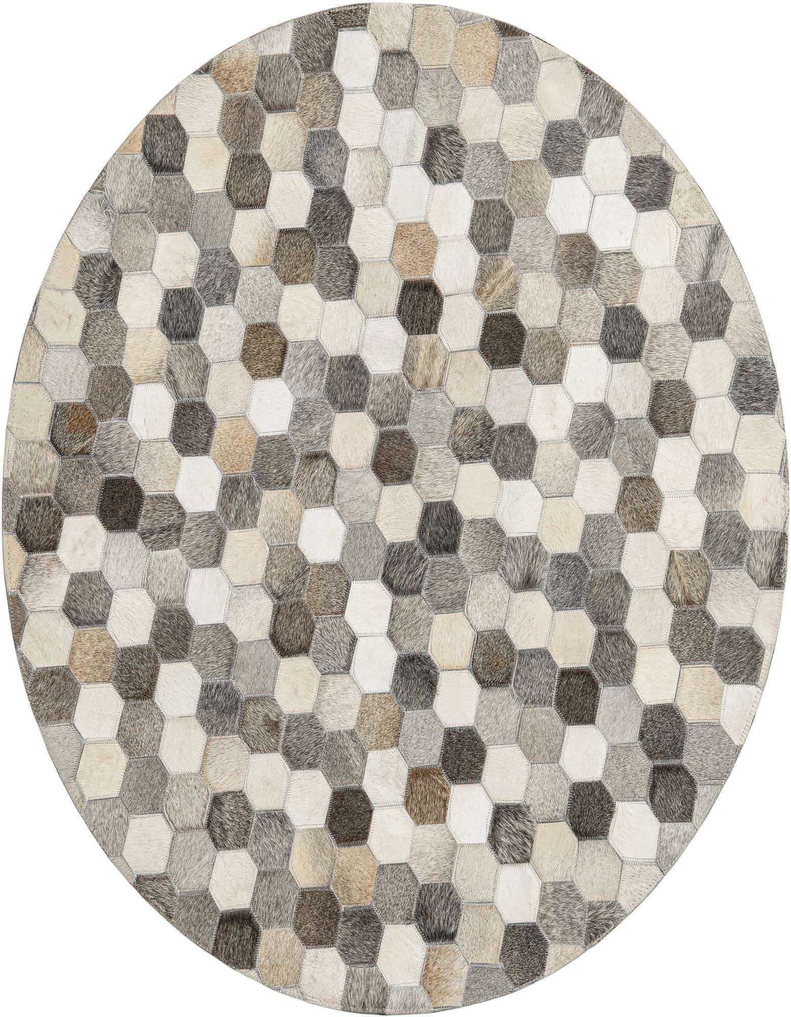 A round, modern cowhide rug featuring a patchwork of hexagonal leather pieces in varying shades of ivory, cream, gray, and white.