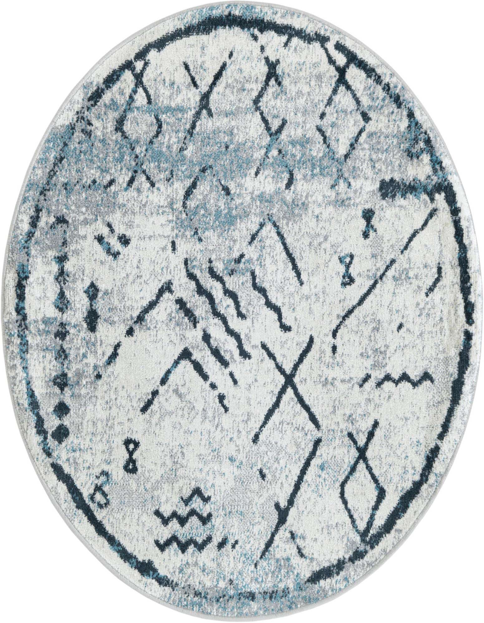A 3' 3 round Kamala Washable rug from Rugs.com, featuring a distressed ivory, gray, and blue tribal pattern.