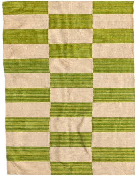 A 10 ft runner rug featuring a modern tribal pattern of alternating ivory and green blocks, perfect for a hallway.