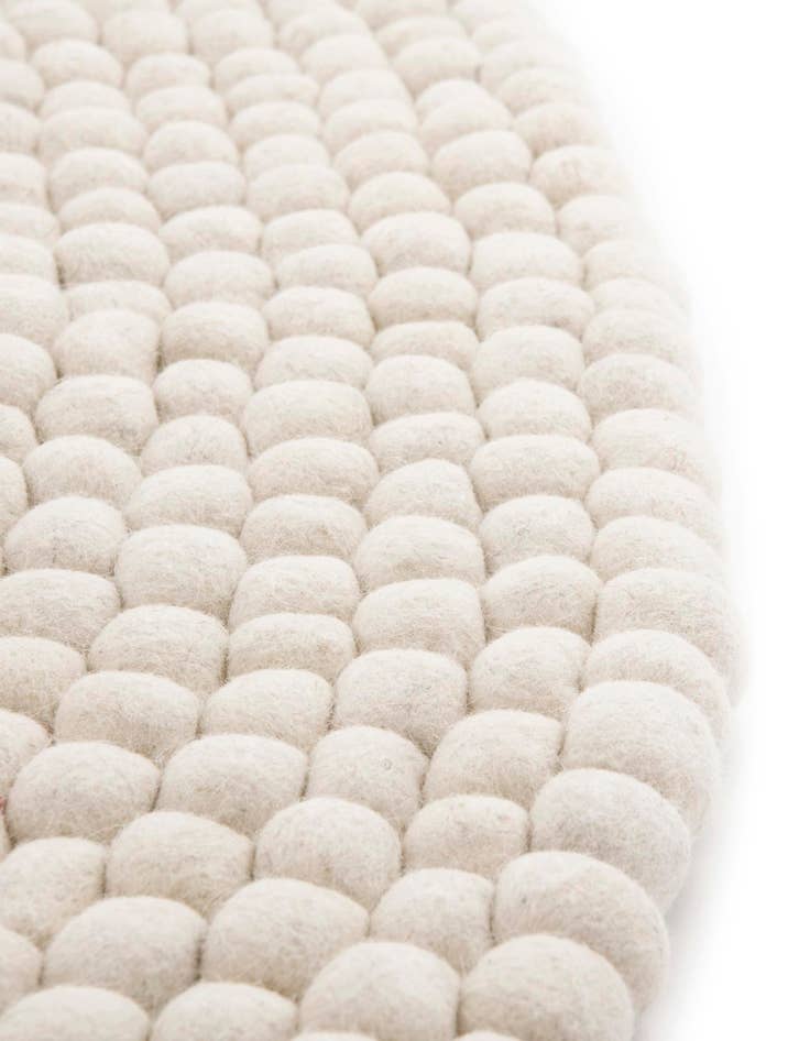Detail image of  2' 2 x 3' 7  Hand Woven Felt Ball Wool Hearth Rug