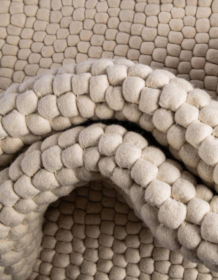 Detail image of  2' 2 x 3' 7  Hand Woven Felt Ball Wool Hearth Rug