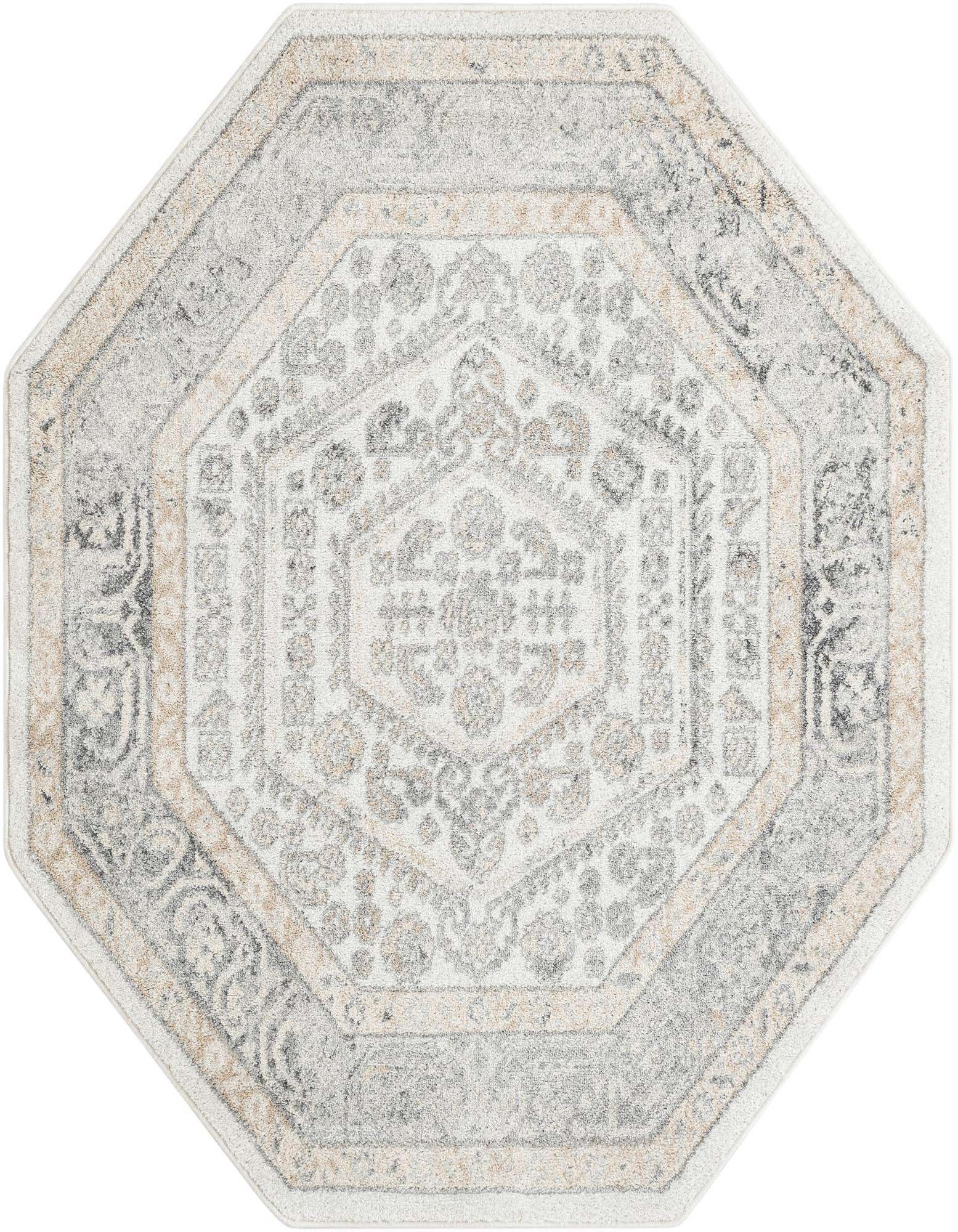 An ivory and cream 5' 3 x 5' 3 octagon rug with a traditional medallion pattern in shades of gray and beige.