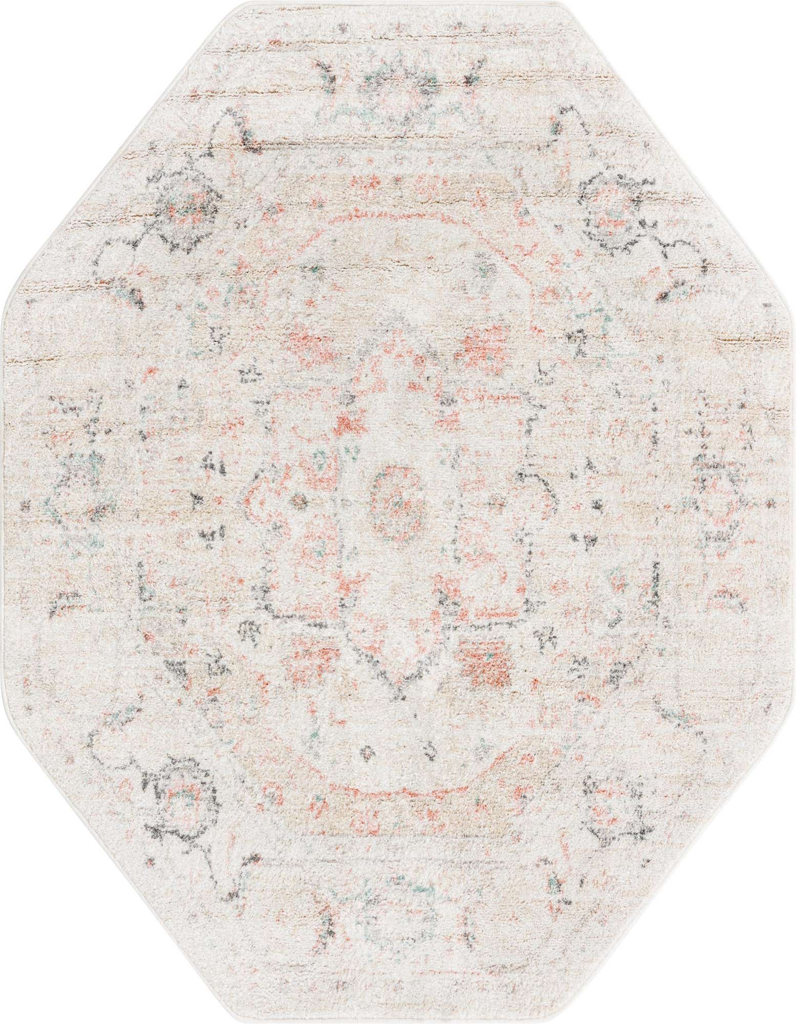 An ivory octagon rug with a distressed traditional medallion pattern in subtle peach, gray, and light blue.