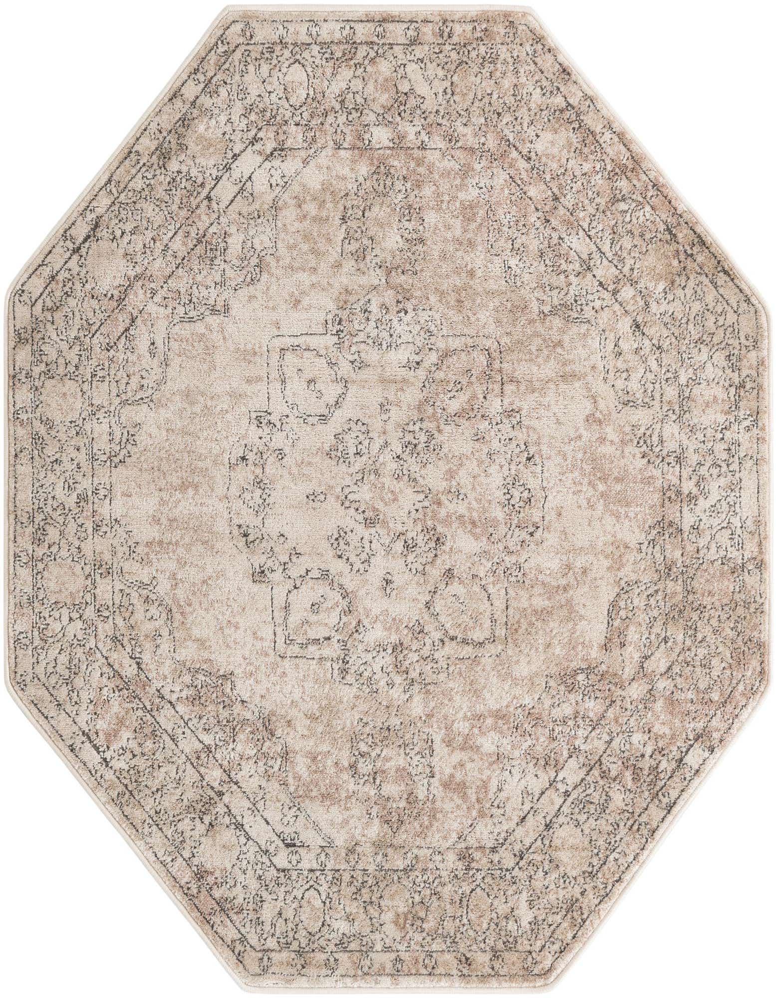 An octagon-shaped ivory and cream rug with a distressed traditional medallion pattern, ideal for a living room or bedroom.