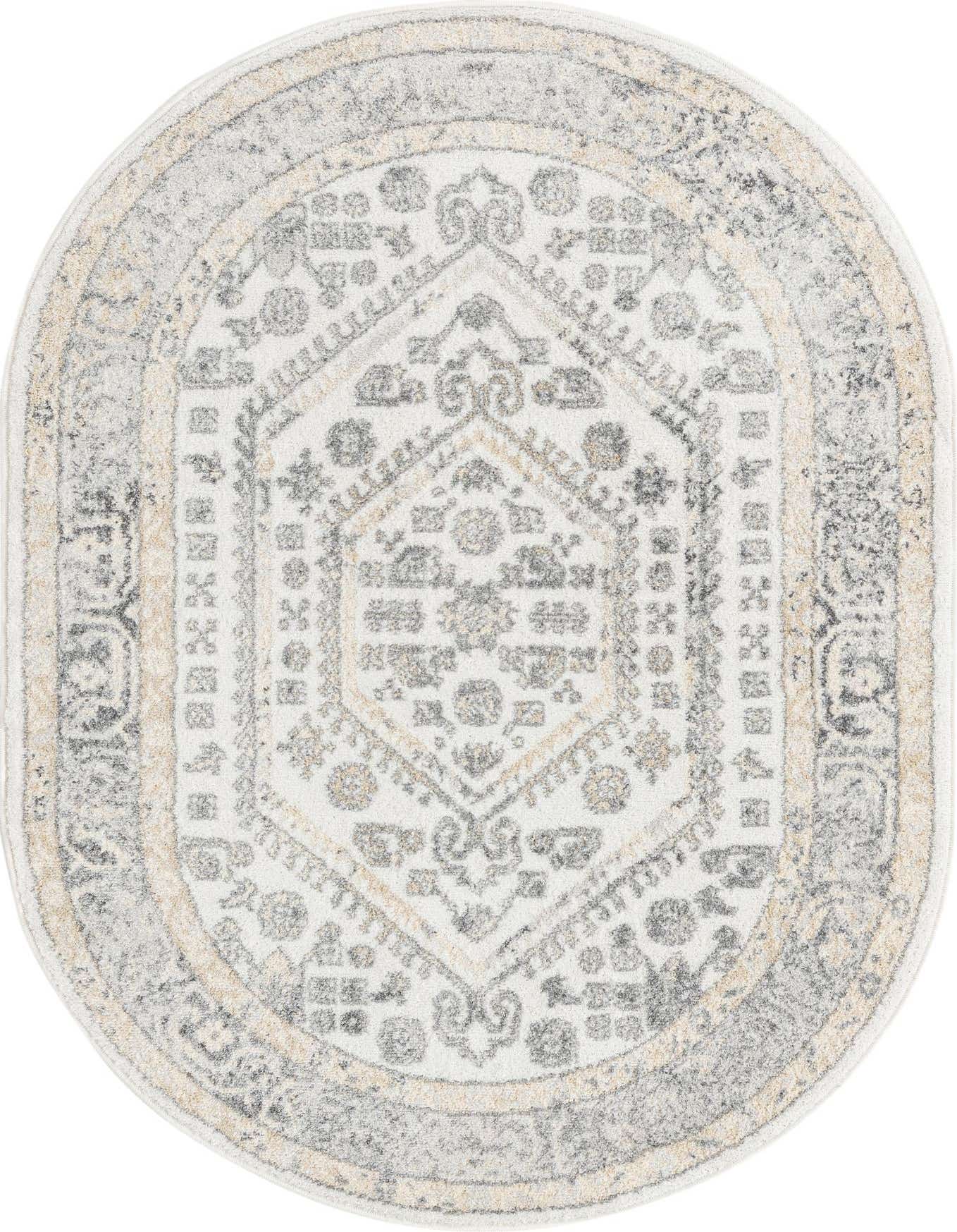An oval ivory and cream rug with a distressed traditional medallion pattern in shades of gray and beige.